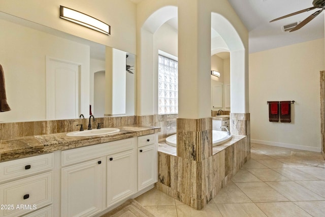 5122 S Miller Pl, Chandler, AZ 85249 - bathroom with ceiling fan, vanity, a bath, and tile patterned flooring
