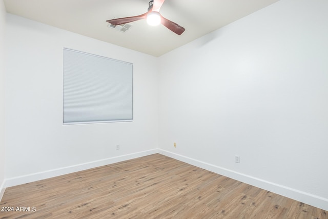 unfurnished room featuring light wood-type flooring