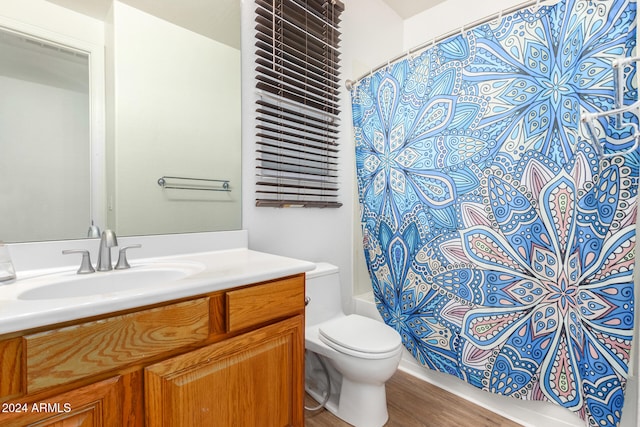 full bathroom with toilet, shower / bath combination with curtain, vanity, and wood-type flooring