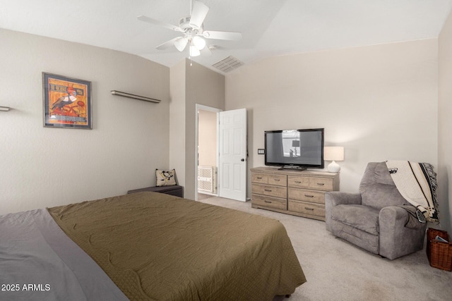 1634 E Harwell Rd, Phoenix, AZ 85042 - bedroom with light carpet, lofted ceiling, and a ceiling fan
