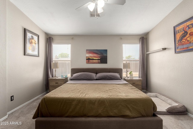 1634 E Harwell Rd, Phoenix, AZ 85042 - bedroom with carpet flooring, baseboards, and a ceiling fan