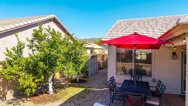 1634 E Harwell Rd, Phoenix, AZ 85042 - fenced backyard featuring a patio area and outdoor dining area