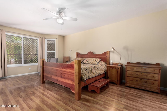 5215 W Del Rio St, Chandler, AZ 85226 - bedroom with ceiling fan, baseboards, and wood finished floors