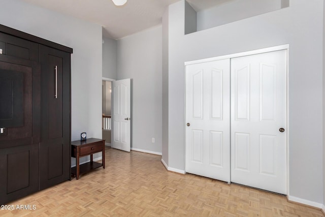 5215 W Del Rio St, Chandler, AZ 85226 - bedroom with a closet, baseboards, and a towering ceiling