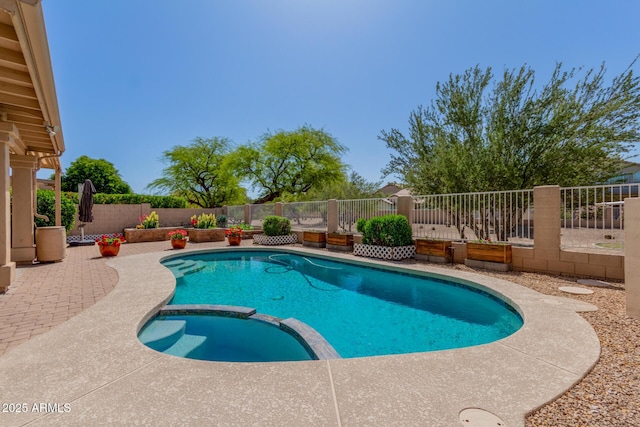 5215 W Del Rio St, Chandler, AZ 85226 - view of swimming pool with a pool with connected hot tub, a patio, and a fenced backyard