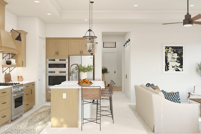 kitchen featuring refrigerator, an island with sink, white double oven, high end stainless steel range oven, and ceiling fan