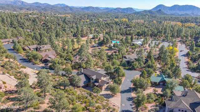 birds eye view of property featuring a mountain view