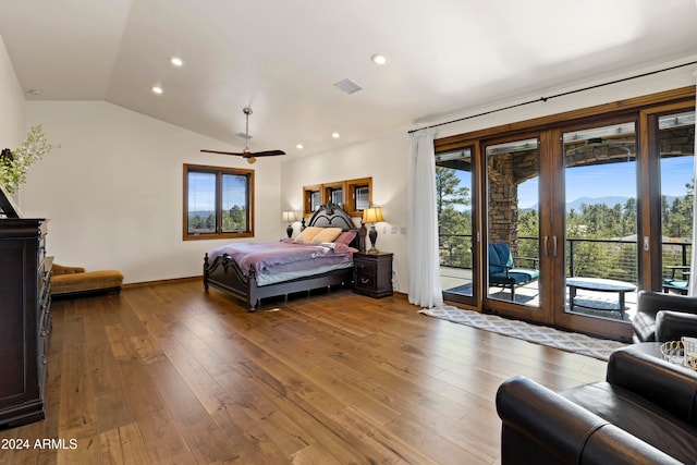 bedroom with access to exterior, hardwood / wood-style floors, and lofted ceiling