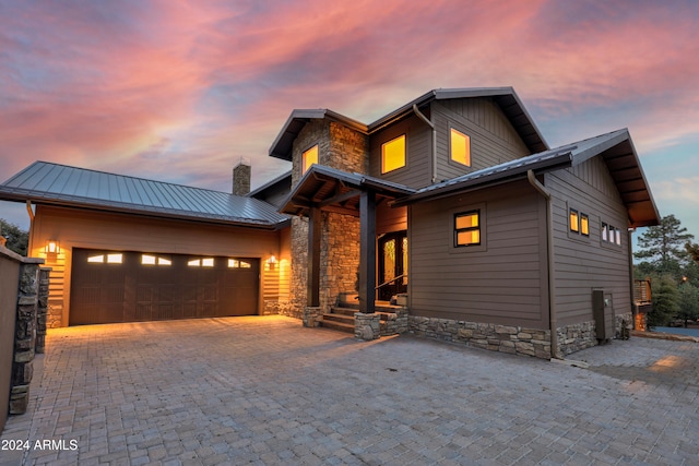 view of front of home with a garage