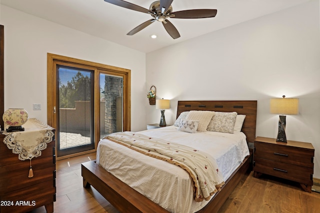 bedroom featuring access to outside, ceiling fan, and wood-type flooring