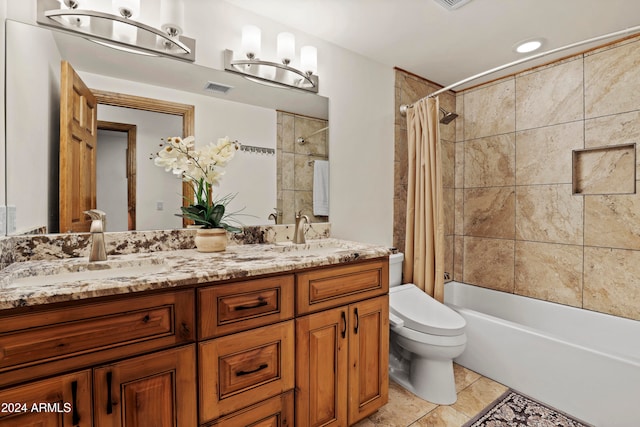 full bathroom with toilet, shower / tub combo, vanity, and tile patterned floors