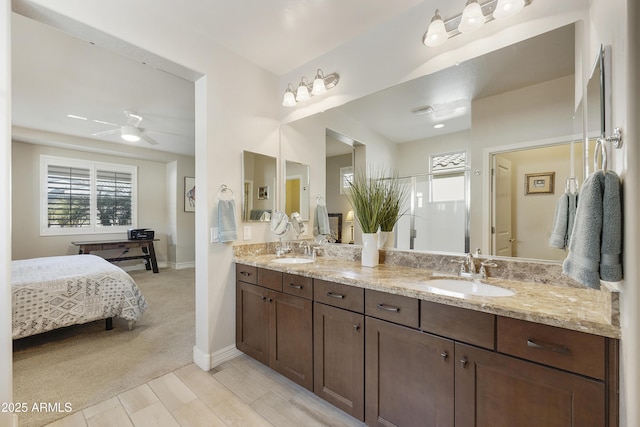 bathroom with vanity and ceiling fan