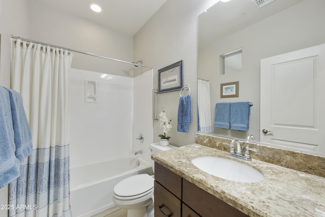 full bathroom featuring vanity, toilet, and shower / bath combo with shower curtain