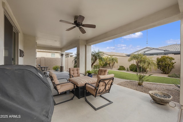 view of patio / terrace featuring area for grilling and ceiling fan