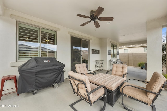 view of patio with grilling area and ceiling fan