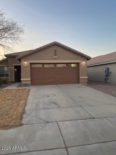 view of front of home with a garage