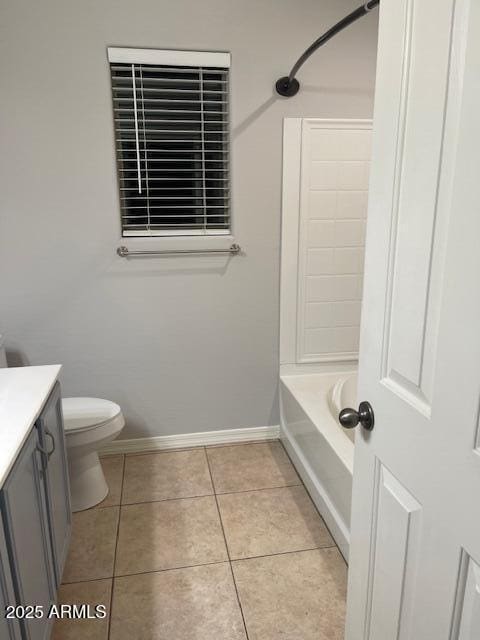 full bathroom featuring vanity, tile patterned flooring, shower / bathtub combination, and toilet