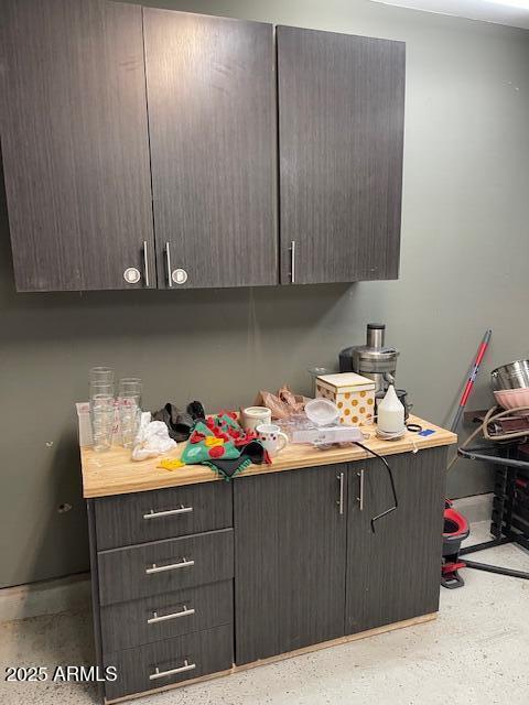 bar with dark brown cabinets