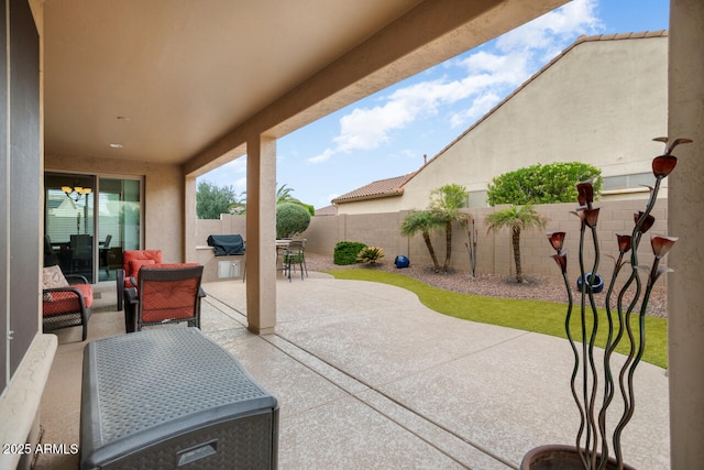 view of patio featuring a fenced backyard