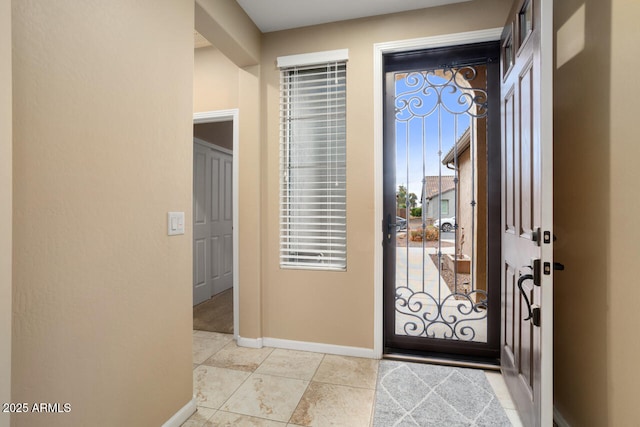 entrance foyer featuring baseboards