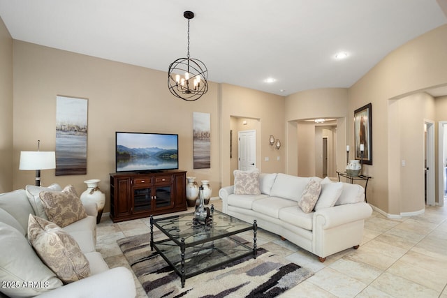 living room featuring recessed lighting, baseboards, and a chandelier