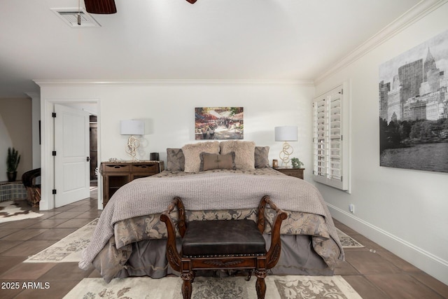 bedroom featuring baseboards, tile patterned flooring, visible vents, and crown molding