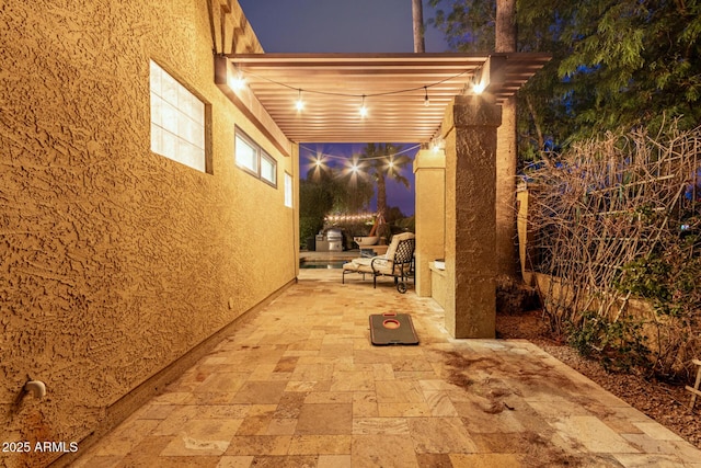 view of patio at night