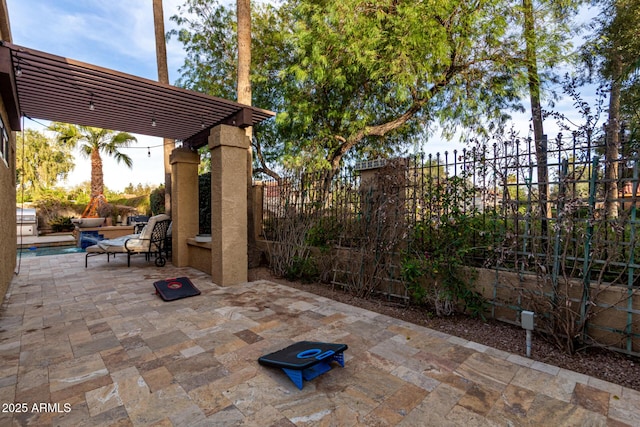 view of patio with fence