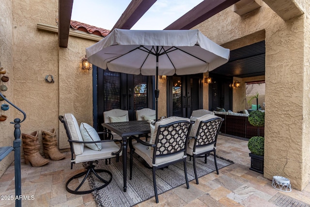 view of patio / terrace with outdoor lounge area and outdoor dining area