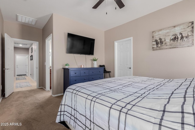 bedroom with visible vents, carpet flooring, baseboards, and ceiling fan