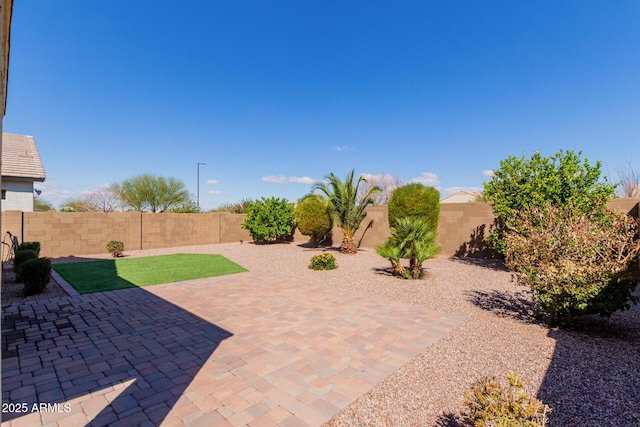 view of patio featuring a fenced backyard