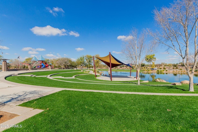 view of community with a lawn and playground community