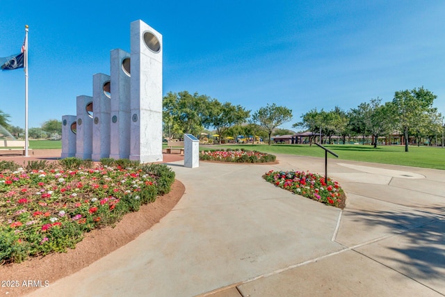 surrounding community featuring a lawn