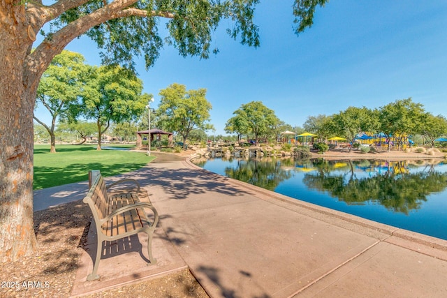 exterior space featuring a gazebo and a water view