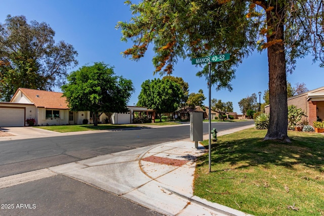 view of road featuring a residential view and sidewalks