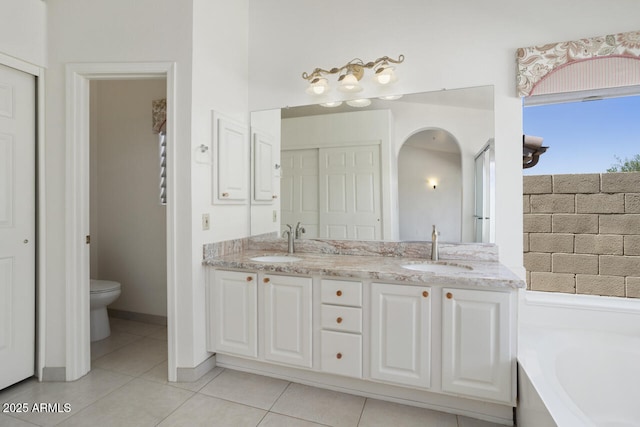 19102 N 91st St, Scottsdale, AZ 85255 - full bath with double vanity, a bath, and tile patterned floors