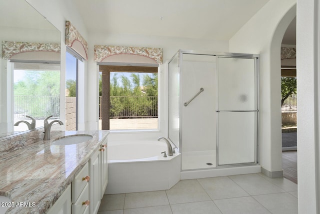 19102 N 91st St, Scottsdale, AZ 85255 - full bathroom featuring tile patterned floors, a garden tub, vanity, and a stall shower
