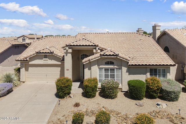 19102 N 91st St, Scottsdale, AZ 85255 - mediterranean / spanish house with a tile roof, driveway, a garage, and stucco siding