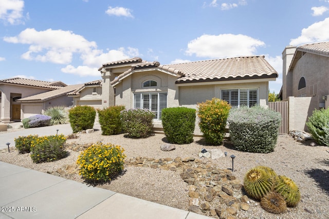19102 N 91st St, Scottsdale, AZ 85255 - view of front of house with a garage, stucco siding, and a tile roof