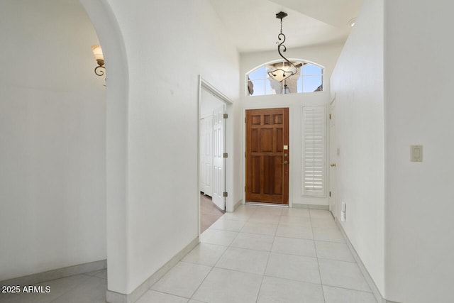 19102 N 91st St, Scottsdale, AZ 85255 - foyer entrance featuring arched walkways and light tile patterned floors