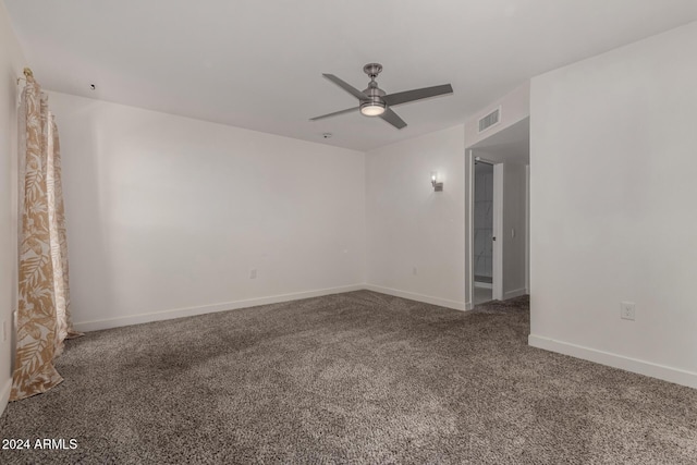 unfurnished room with ceiling fan and carpet floors