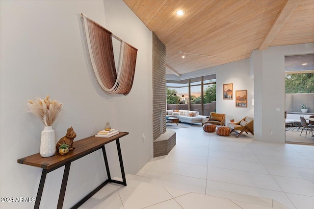 hallway with wood ceiling and light tile patterned floors