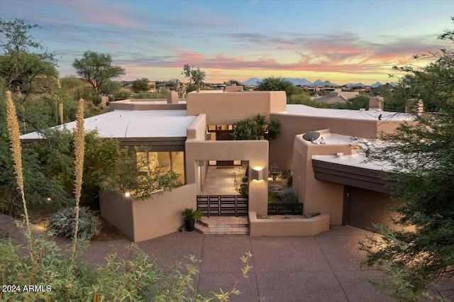 southwest-style home with a patio