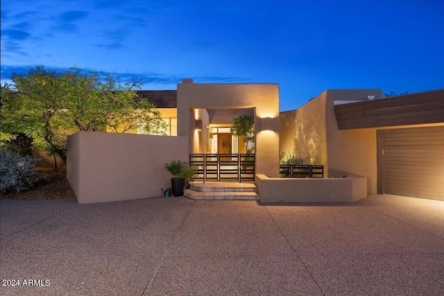 view of front facade with a patio area