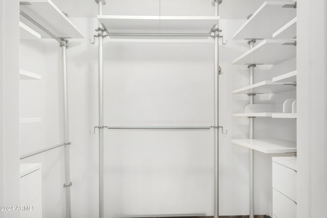 bathroom with a shower with shower door