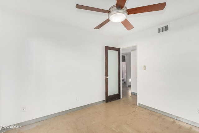 unfurnished room with ceiling fan and light colored carpet