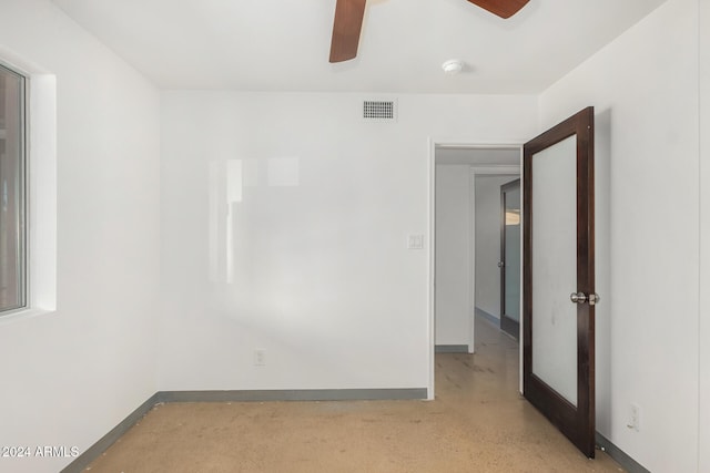 spare room with ceiling fan