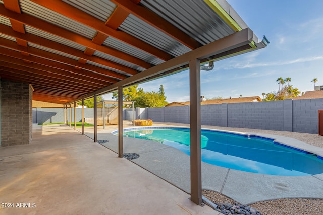 view of pool featuring a patio area