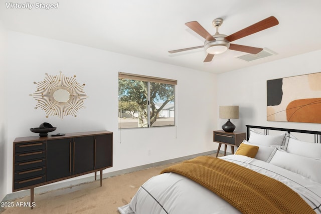 3033 E Sierra St, Phoenix, AZ 85028 - bedroom featuring light colored carpet, baseboards, and ceiling fan