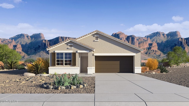 40040 W Agave Rd, Maricopa, AZ 85138 - view of front of property with a mountain view, an attached garage, driveway, and stucco siding